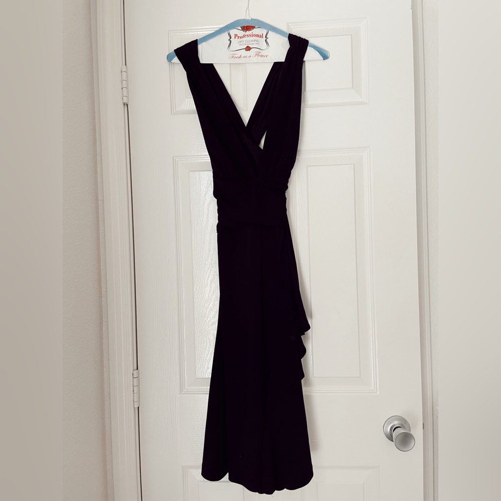 Low drop neck line black dress. Super sexy on.